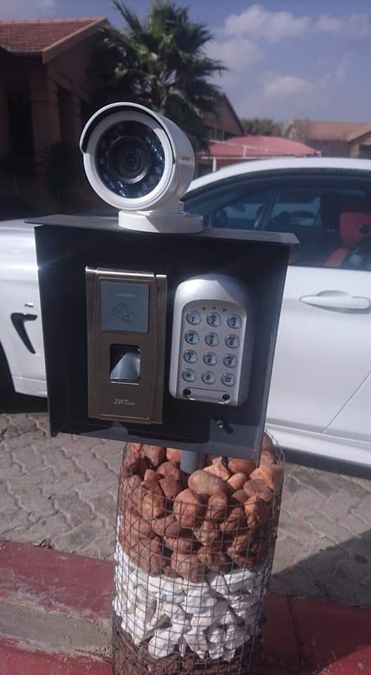 Access control keypad and camera at a site entrance